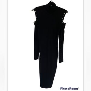 Zara knit rib turtleneck dress with cut-out shoulders in black.